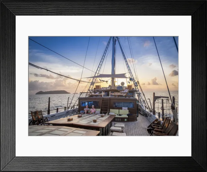Framed Print : Asia, Indonesia, Spice Islands, Maluku, tourists relaxing on the the deck of the Seatrek Framed Print : Asia, Indonesia, Spice Islands, Maluku, tourists relaxing on the the deck of the Seatrek