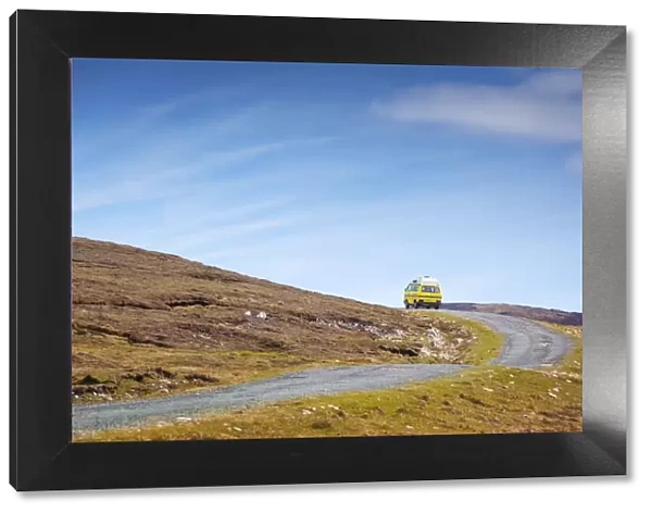 Ireland, Co. Donegal, Arranmore island, campervan on country road
