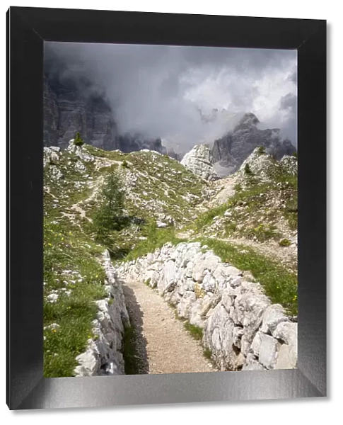 Italian Dolomites, 1st world war tracks, cloudy sky. Veneto, Italy
