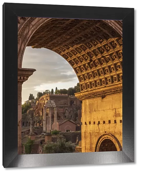 Europe, Italy, Rome. The arch of Septimus Severus in the Forum Romanum at sunrise