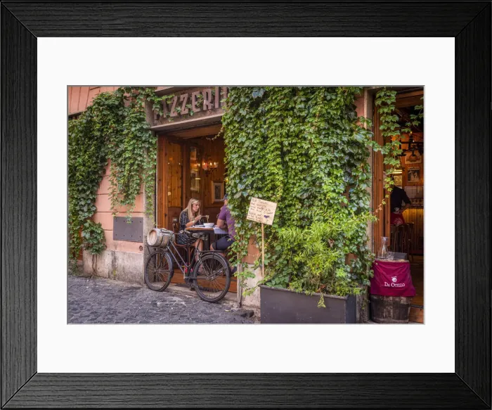 Framed Print : Europe, Italy, Rome. A restaurant in Trastevere with a couple eating spaghetti Framed Print : Europe, Italy, Rome. A restaurant in Trastevere with a couple eating spaghetti