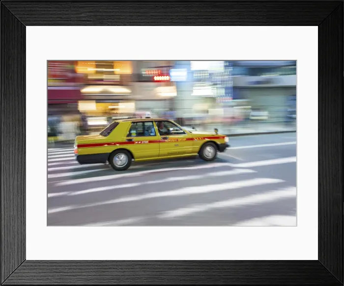 Framed Print : Motion blurred yellow taxi cab on pedestrian crossing, Tokyo, Japan Framed Print : Motion blurred yellow taxi cab on pedestrian crossing, Tokyo, Japan