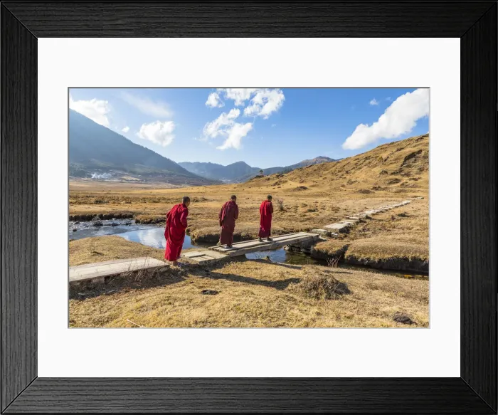 Framed Print : Novice Monks (Child Monks) crossing a river in Phobjikha Valley, Bhutan Framed Print : Novice Monks (Child Monks) crossing a river in Phobjikha Valley, Bhutan
