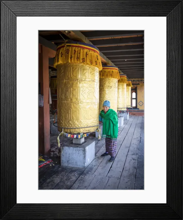 Framed Print : Woman spinning prayer wheels at the National Memorial Chhorten, Thimphu, Bhutan Framed Print : Woman spinning prayer wheels at the National Memorial Chhorten, Thimphu, Bhutan