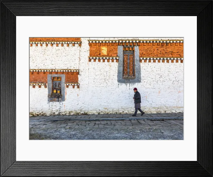 Framed Print : A man walking around Jambey Lhakhang, Jakar, Bumthang District, Bhutan Framed Print : A man walking around Jambey Lhakhang, Jakar, Bumthang District, Bhutan