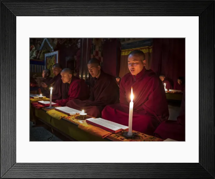 Framed Print : Monks during evening candle light prayer in Lhodrak Kharchu monastery, Jakar