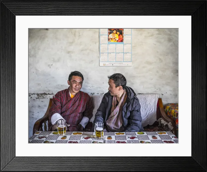 Framed Print : Two Bhutanese men drinking beer in a local bar, Ura, Bumthang District, Bhutan Framed Print : Two Bhutanese men drinking beer in a local bar, Ura, Bumthang District, Bhutan