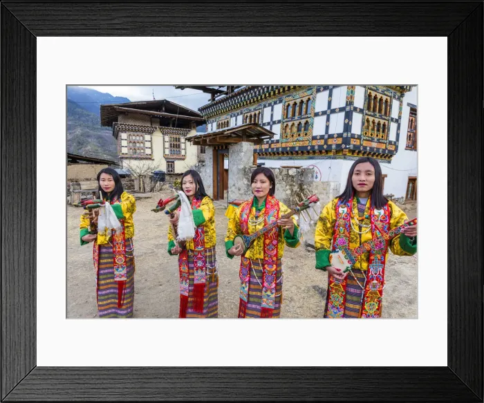 Framed Print : Female performers playing instruments at a local festival in Paro District, Bhutan Framed Print : Female performers playing instruments at a local festival in Paro District, Bhutan