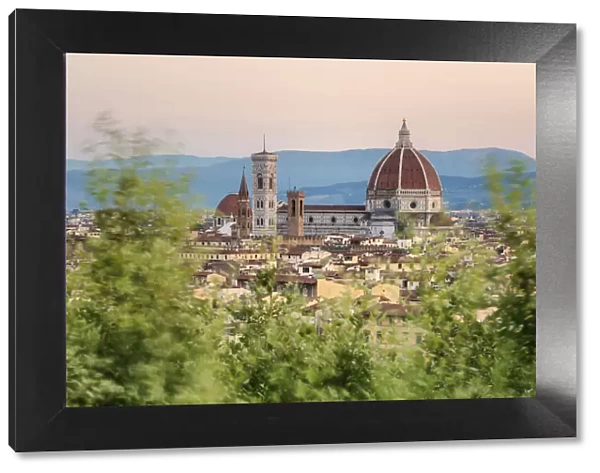 Cityscape and Cathedral of Santa Maria del Fiore and tower bell of Giotto framed