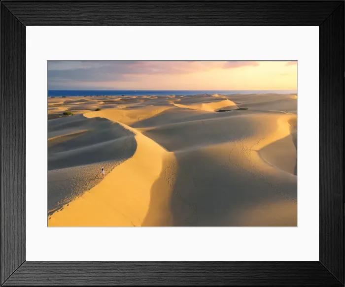 Framed Print : Tourist walking on sand dunes at sunset. Maspalomas, Las Palmas, Gran Canaria Framed Print : Tourist walking on sand dunes at sunset. Maspalomas, Las Palmas, Gran Canaria