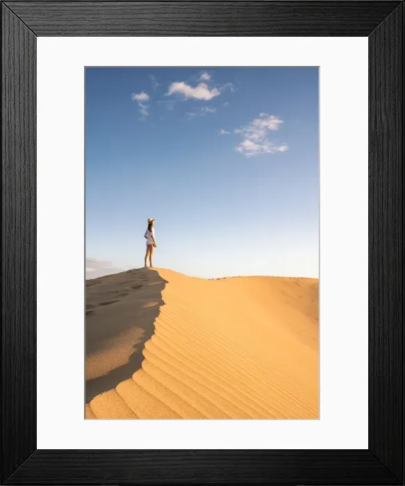 Framed Print : Tourist admiring the view on sand dunes. Maspalomas, Las Palmas, Gran Canaria Framed Print : Tourist admiring the view on sand dunes. Maspalomas, Las Palmas, Gran Canaria