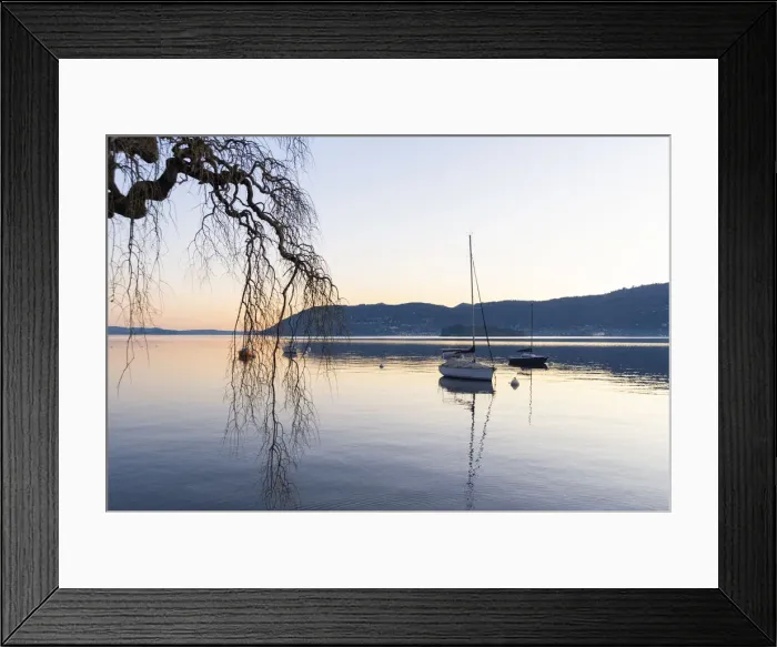 Framed Print : Suna, Verbania province, Piedmont, Italy Sailboat on a buoy, sunset hour Framed Print : Suna, Verbania province, Piedmont, Italy Sailboat on a buoy, sunset hour