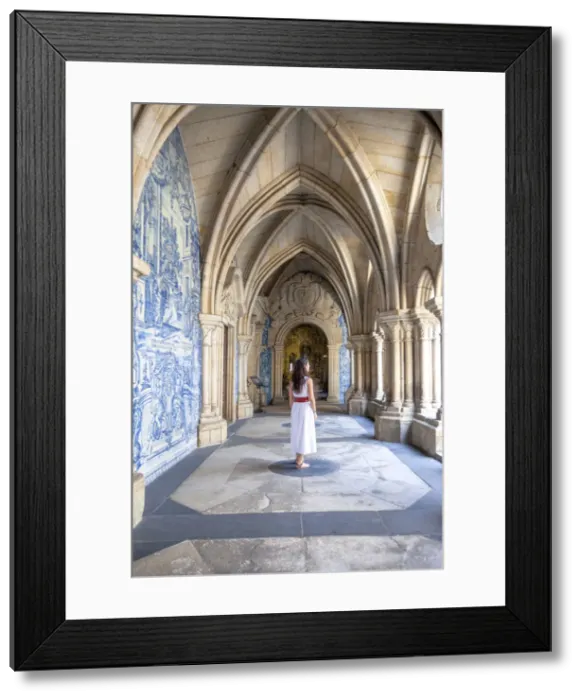 Framed Print : A woman admires the cloister arcades of Porto Cathedral (Sao do Porto), Porto Framed Print : A woman admires the cloister arcades of Porto Cathedral (Sao do Porto), Porto
