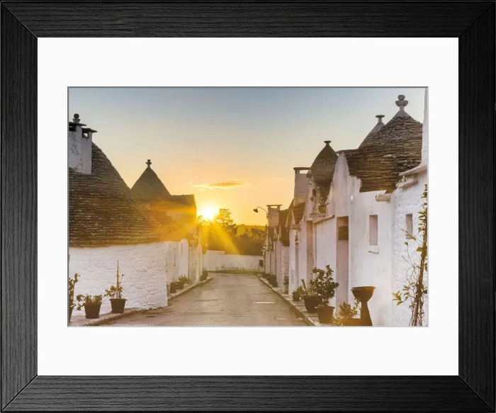Framed Print : Sunrise between trulli houses. Unesco World Heritage Site, Alberobello, Province of Bari Framed Print : Sunrise between trulli houses. Unesco World Heritage Site, Alberobello, Province of Bari