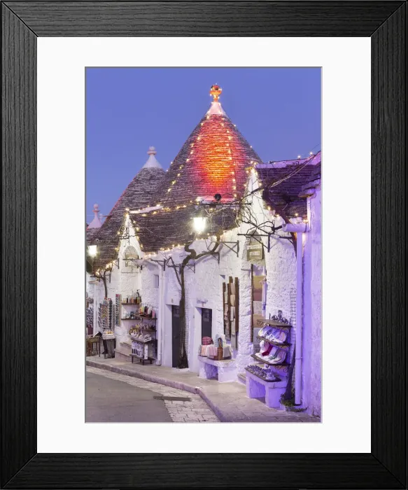 Framed Print : Traditional trullo house illuminated by christmas lights Framed Print : Traditional trullo house illuminated by christmas lights