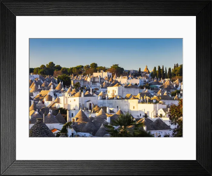 Framed Print : Elevated view of monumental trulli area at sunrise. Unesco World Heritage Site Framed Print : Elevated view of monumental trulli area at sunrise. Unesco World Heritage Site