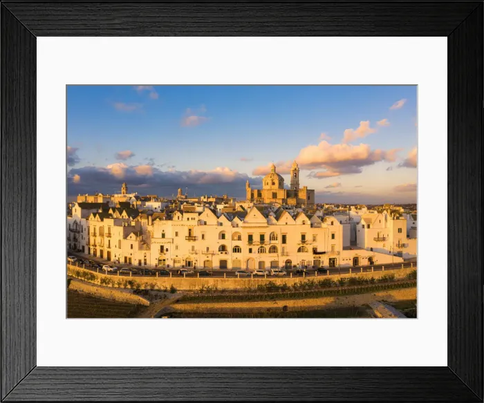Framed Print : Aerial view of Locorotondo village at sunset. Locorotondo, Apulia, Italy Framed Print : Aerial view of Locorotondo village at sunset. Locorotondo, Apulia, Italy