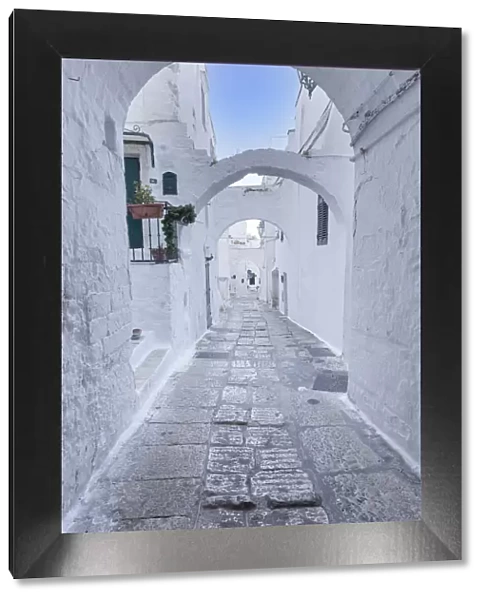 White narrow street of Polignano a Mare, Apulia, Italy