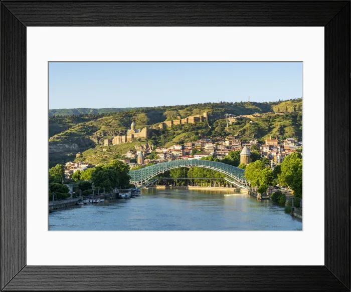 Framed Print : The Pace bridge along Kura river with Narikala castle in the background. Tbilisi, Georgia Framed Print : The Pace bridge along Kura river with Narikala castle in the background. Tbilisi, Georgia