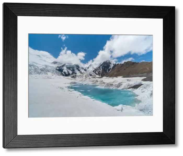 Framed Print : Glacier lake at the base of Peak Lenin mount during early summer Framed Print : Glacier lake at the base of Peak Lenin mount during early summer