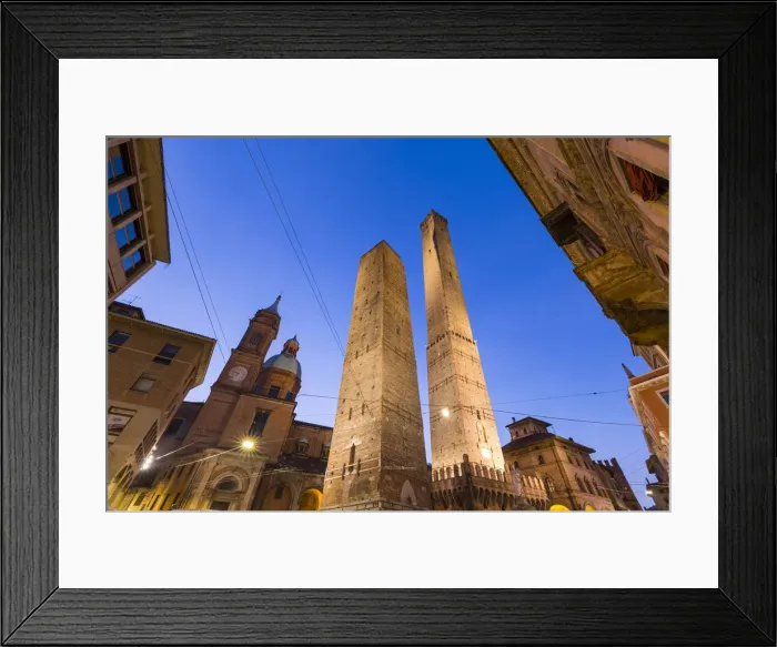 Framed Print : Asinelli and Garisenda towers in Bologna at twilight. Bologna, Emilia Romagna, Italy