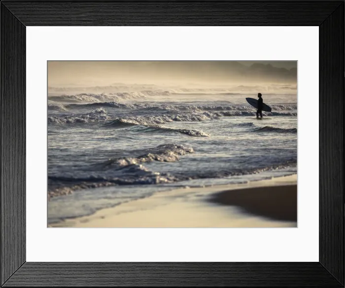 Framed Print : A surfer observes sea at Playa del Puntal, Santander, Cantabria, Spain Framed Print : A surfer observes sea at Playa del Puntal, Santander, Cantabria, Spain
