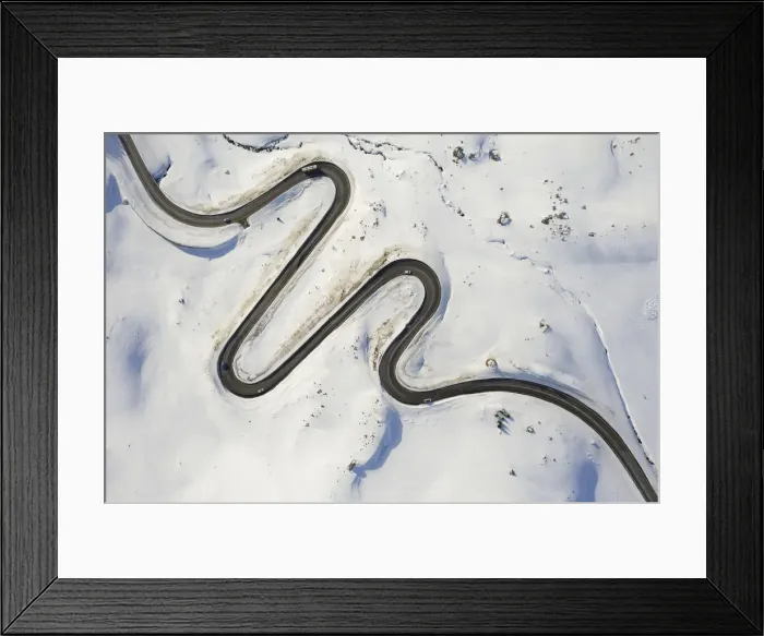 Framed Print : Aerial view of curves of Maloja Pass road, Bregaglia Valley, canton of Graubunden Framed Print : Aerial view of curves of Maloja Pass road, Bregaglia Valley, canton of Graubunden