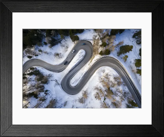 Framed Print : Aerial view of curves of Maloja Pass road, Bregaglia Valley, canton of Graubunden Framed Print : Aerial view of curves of Maloja Pass road, Bregaglia Valley, canton of Graubunden