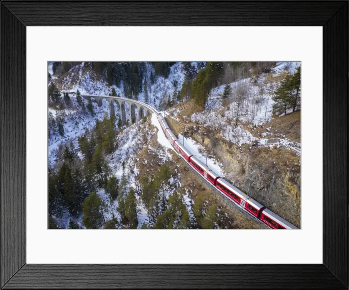 Framed Print : Aerial view of the famous Bernina Express passing over the Landwasser Viaduct Framed Print : Aerial view of the famous Bernina Express passing over the Landwasser Viaduct