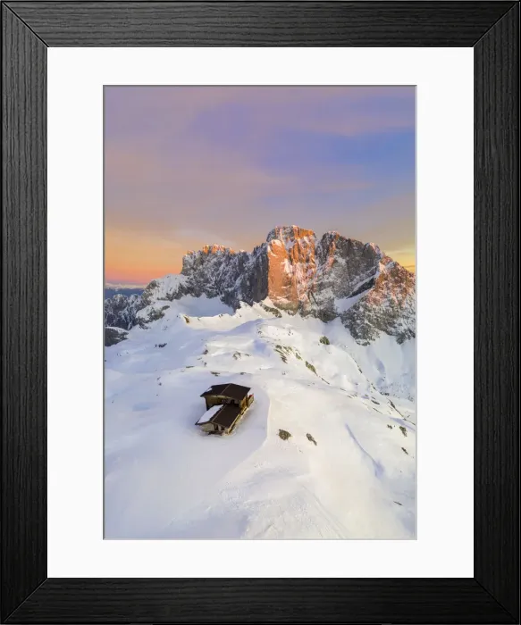 Framed Print : Aerial view of the snow-covered north face of the Presolana mountain Framed Print : Aerial view of the snow-covered north face of the Presolana mountain