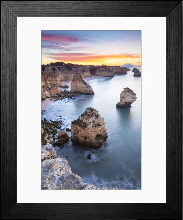 Framed Print : A colorful sunrise at the beach of Praia da Marinha, Caramujeira, Lagoa, Algarve Framed Print : A colorful sunrise at the beach of Praia da Marinha, Caramujeira, Lagoa, Algarve