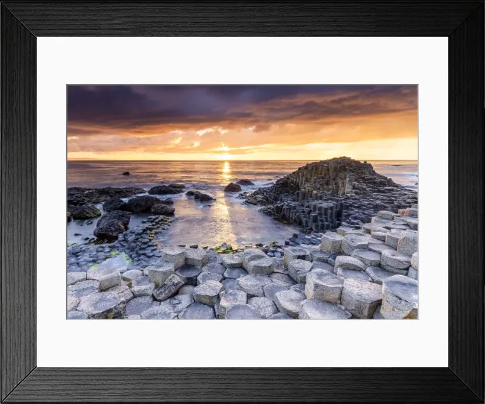 Framed Print : An epic sunset at the Giants Causeway with its iconic basalt columns Framed Print : An epic sunset at the Giants Causeway with its iconic basalt columns