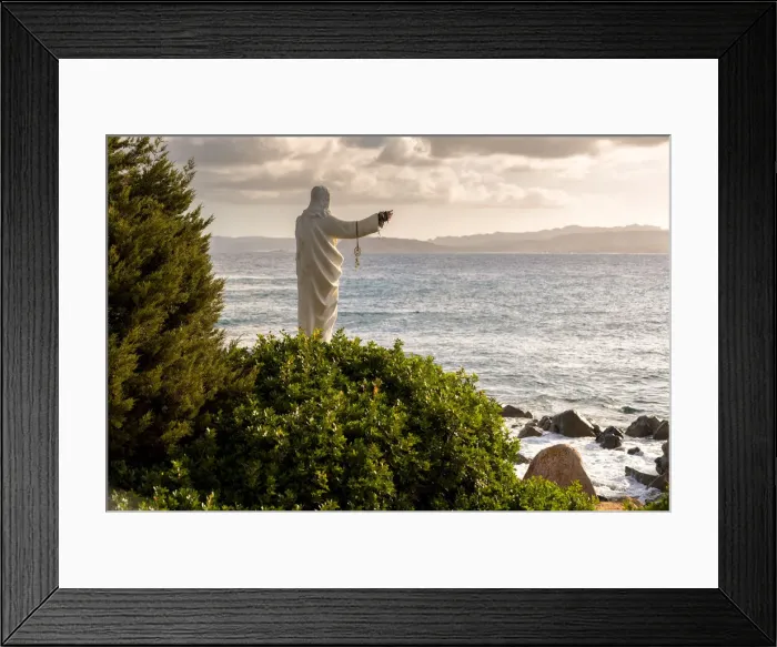 Framed Print : Statue of Christ on the beach, Sardinia, Sassari province, Italy