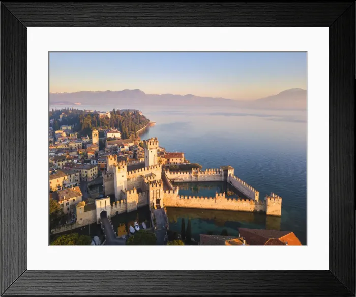 Framed Print : Aerial view at dawn of Sirmione village in Garda lake, Lombardy district Framed Print : Aerial view at dawn of Sirmione village in Garda lake, Lombardy district