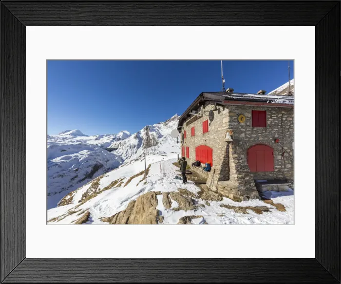 Framed Print : Hiker photographing the snowy peaks from Citta di Bosco hut, Val Formazza Framed Print : Hiker photographing the snowy peaks from Citta di Bosco hut, Val Formazza