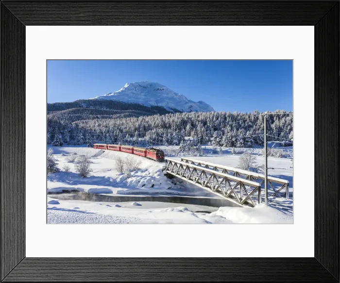 Framed Print : Bernina Express train in the snowy landscape, Pontresina, Engadine, canton of Graubunden Framed Print : Bernina Express train in the snowy landscape, Pontresina, Engadine, canton of Graubunden