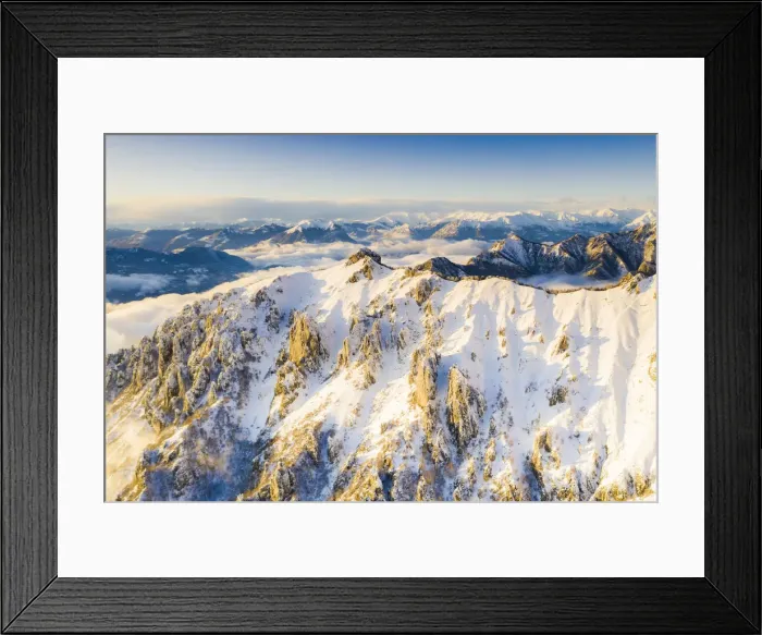 Framed Print : Aerial view of snow capped Torrione del Pertusio and Monti Lariani, Lake Como Framed Print : Aerial view of snow capped Torrione del Pertusio and Monti Lariani, Lake Como