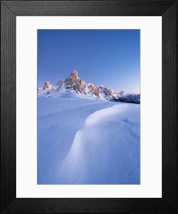 Framed Print : Dusk lights on Ra Gusela mountain and snowy slopes, Giau Pass, Dolomites Framed Print : Dusk lights on Ra Gusela mountain and snowy slopes, Giau Pass, Dolomites