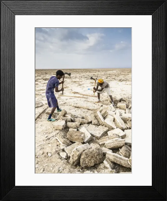 Framed Print : Two miners breaking up salt blocks in the salt flat, Danakil Depression, Afar Region Framed Print : Two miners breaking up salt blocks in the salt flat, Danakil Depression, Afar Region
