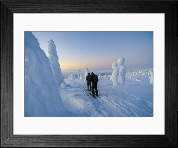 Framed Print : Hikers walking in the woods of Riisitunturi national park, posio, lapland, finland