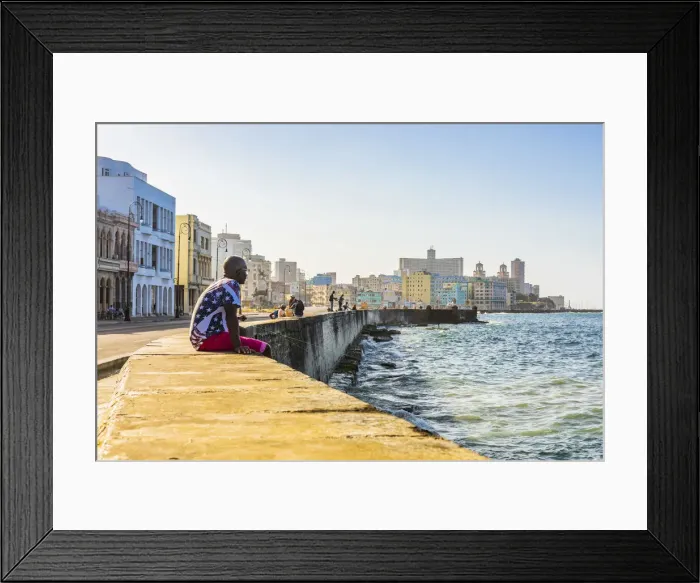 Framed Print : A man sitting and watching the ocean from the Malecon, La Habana Vieja (Old Town), Havana Framed Print : A man sitting and watching the ocean from the Malecon, La Habana Vieja (Old Town), Havana