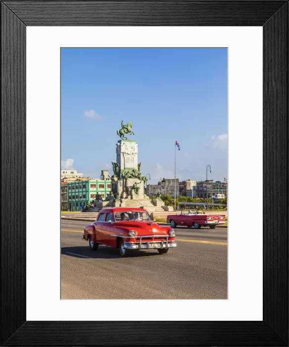 Framed Print : A classic car driving in front of Parque Antonio Maceo on the Malecon Framed Print : A classic car driving in front of Parque Antonio Maceo on the Malecon