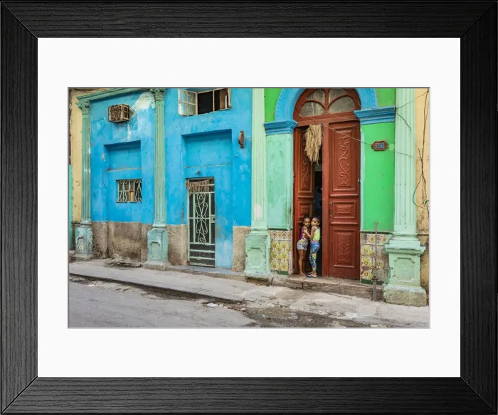 Framed Print : Two young girls peaking through the door of their house in Centro Habana Province, Havana Framed Print : Two young girls peaking through the door of their house in Centro Habana Province, Havana
