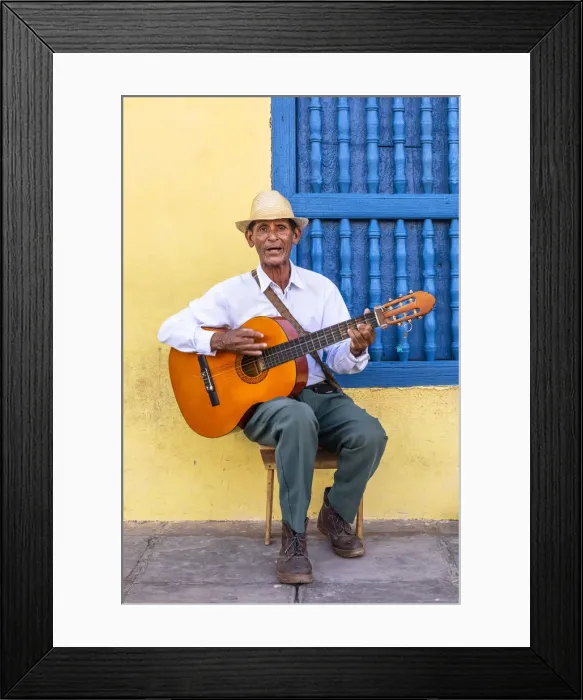 Framed Print : A musician playing the guitar in Plaza Mayor in Trinidad, Sancti Spiritus, Cuba Framed Print : A musician playing the guitar in Plaza Mayor in Trinidad, Sancti Spiritus, Cuba