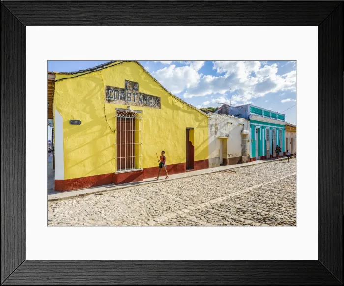 Framed Print : A child walking in a street in Trinidad, Sancti Spiritus, Cuba Framed Print : A child walking in a street in Trinidad, Sancti Spiritus, Cuba