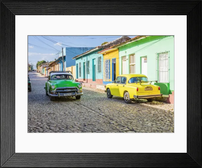 Framed Print : A classic car driving in a street in Trinidad, Sancti Spiritus, Cuba Framed Print : A classic car driving in a street in Trinidad, Sancti Spiritus, Cuba