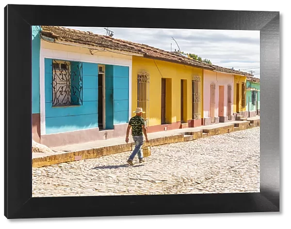 A man walking in a street in Trinidad, Sancti Spiritus, Cuba