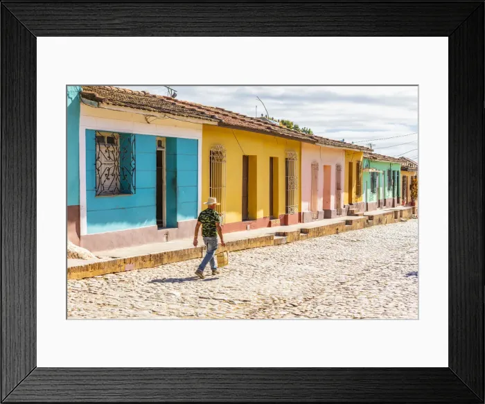 Framed Print : A man walking in a street in Trinidad, Sancti Spiritus, Cuba Framed Print : A man walking in a street in Trinidad, Sancti Spiritus, Cuba