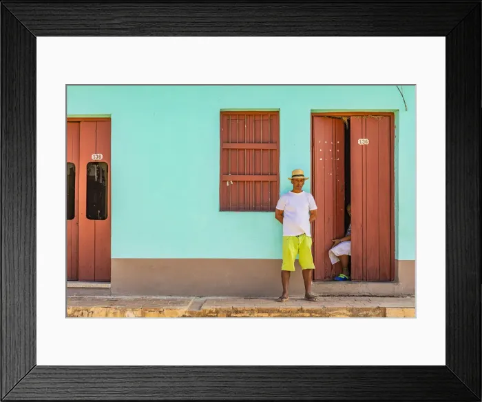 Framed Print : A man standing outside his house in a street in Trinidad, Sancti Spiritus, Cuba Framed Print : A man standing outside his house in a street in Trinidad, Sancti Spiritus, Cuba