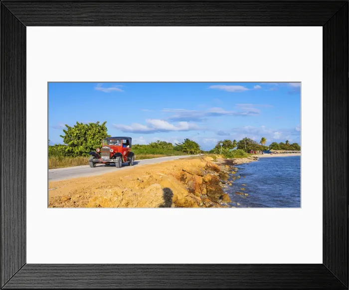 Framed Print : A classic car driving in Playa Ancoa, in Trinidad, Sancti Spiritus, Cuba Framed Print : A classic car driving in Playa Ancoa, in Trinidad, Sancti Spiritus, Cuba